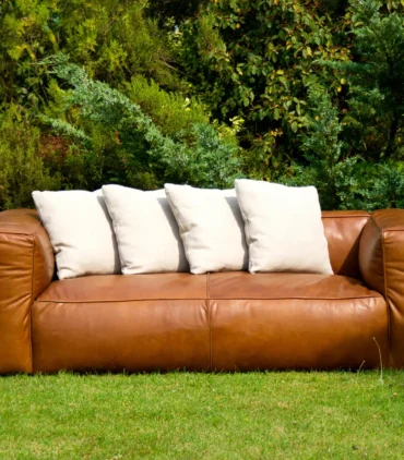 Best sofa for Kerala climate made of durable leather material suitable for humid tropical weather.